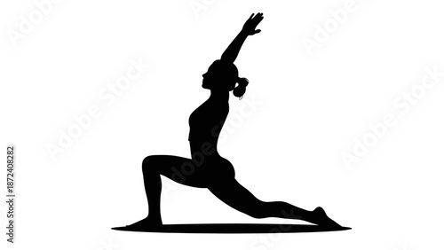 Woman in a yoga warrior pose silhouette.