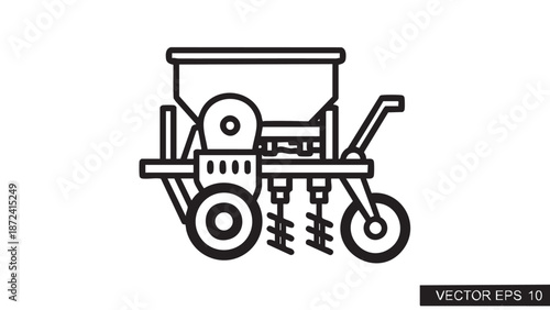 Agricultural machinery in action on a farm field from a side viewpoint