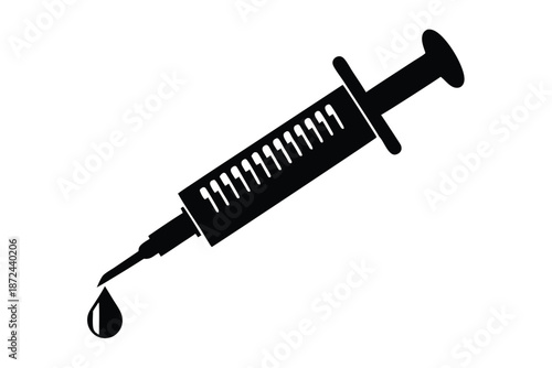 Black and white syringe with a single droplet of fluid at the needle's tip