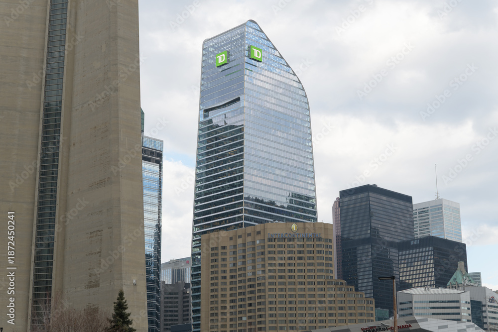 Naklejka premium mix of contemporary architectural styles (CN Tower base, TD Terrace, Intercontinental hotel, and office buildings) viewed from Bremner Blvd, Toronto