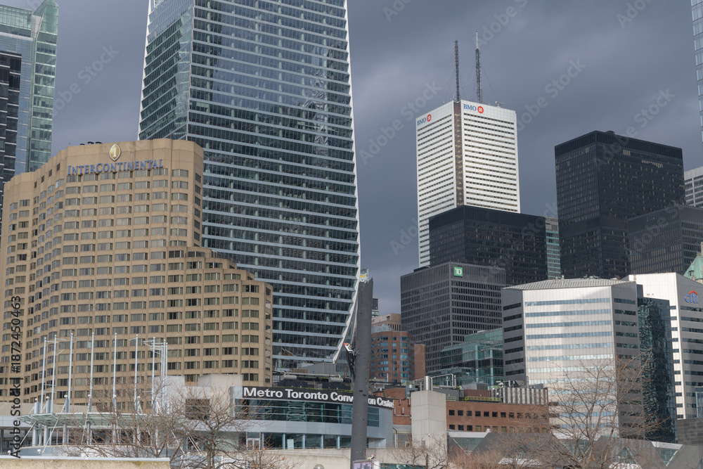 Obraz premium mix of contemporary architectural styles (TD Terrace, Intercontinental hotel, and office buildings) viewed from Bremner Blvd, Toronto (Roundhouse Park)
