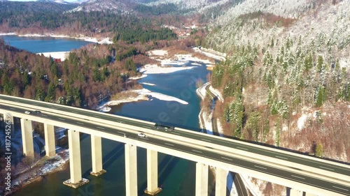 Viaduct Bajer above lake, scenic highway in Gorski Kotar region of Croatia in winter