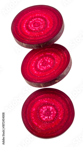 Fresh beetroot slices falling, healthy organic food concept