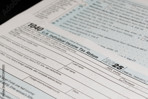 A low-angle close up of IRS form 20251040 with focus on filing year
