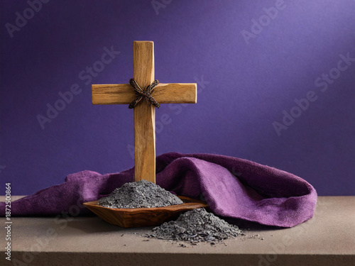 Wooden cross with ashes and purple cloth symbolizing Lent and Ash Wednesday, Christian faith and repentance concept