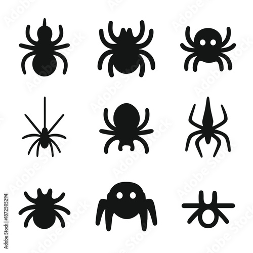 Black spider silhouettes collection on gray background