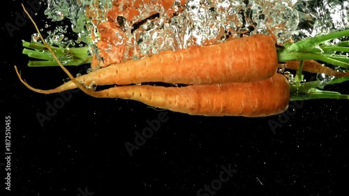 Super slow motion fresh carrots . Filmed on a high-speed camera at 1000 fps. High quality FullHD footage