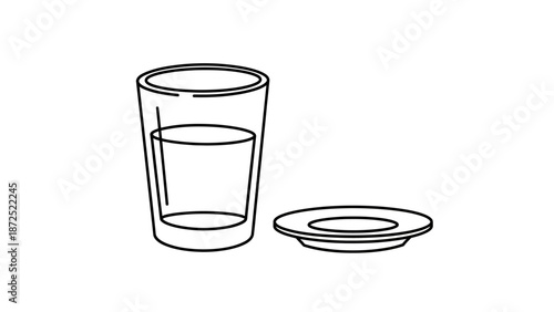 Glass with water and plate.