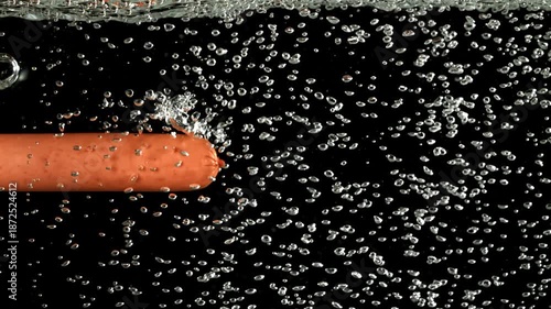 Super slow motion sausages underwater with air bubbles . Filmed on a high-speed camera at 1000 fps. High quality FullHD footage