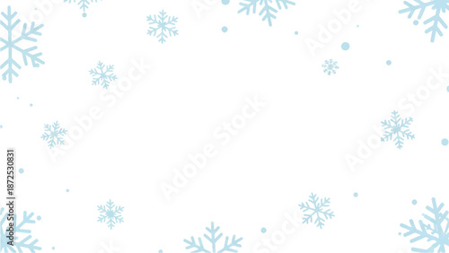 Snowflakes gently falling around a blank white space from a top-down viewpoint