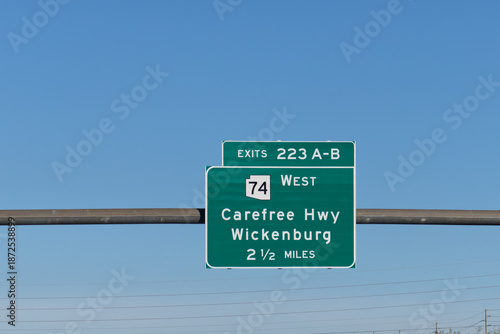 exit 223 A-B sign on I-17 for AZ-74 West to Carefree Highway and Wickenburg, Arizona