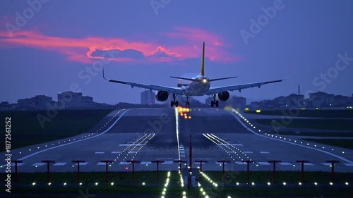 Commercial Twin-Engine Passenger Aircraft Landing in Strong Crosswinds at Sunset