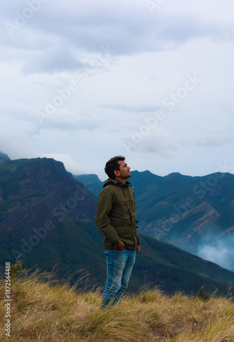 hiker on top of a mountain