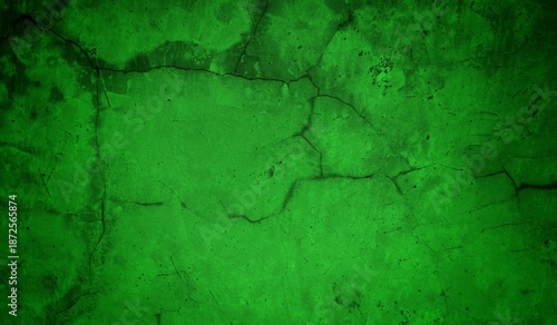 Vivid, textured green surface with pronounced cracks creates a bold abstract backdrop. Ideal for nature-inspired, eco-friendly, or modern design projects needing a striking green texture.