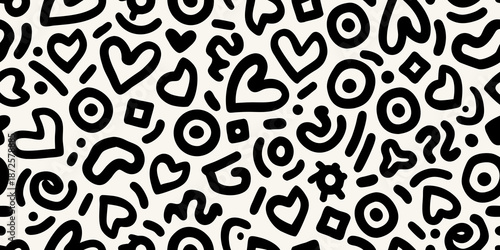 Abstract black and white doodle pattern with various playful shapes