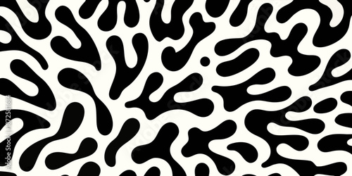 Abstract black and white organic shapes create a flowing seamless pattern