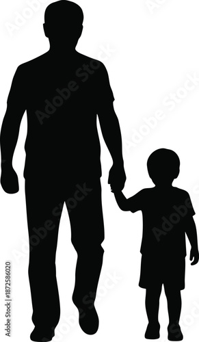 Silhouette of father and son walking hand in hand