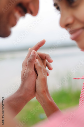 close up of a young couple having a conversation