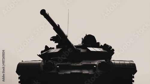 Low angle tank silhouette showcasing military vehicle with armored body, large cannon turret, weapon system, and combat ready protection defense