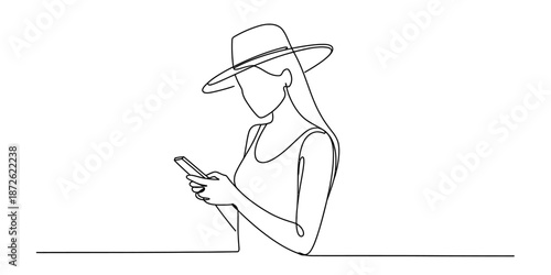 Stylish woman in a wide-brimmed hat engaged with her mobile phone in modern line art