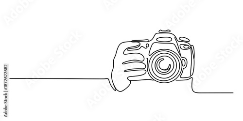 Continuous line drawing of a hand holding a professional dslr camera for photography