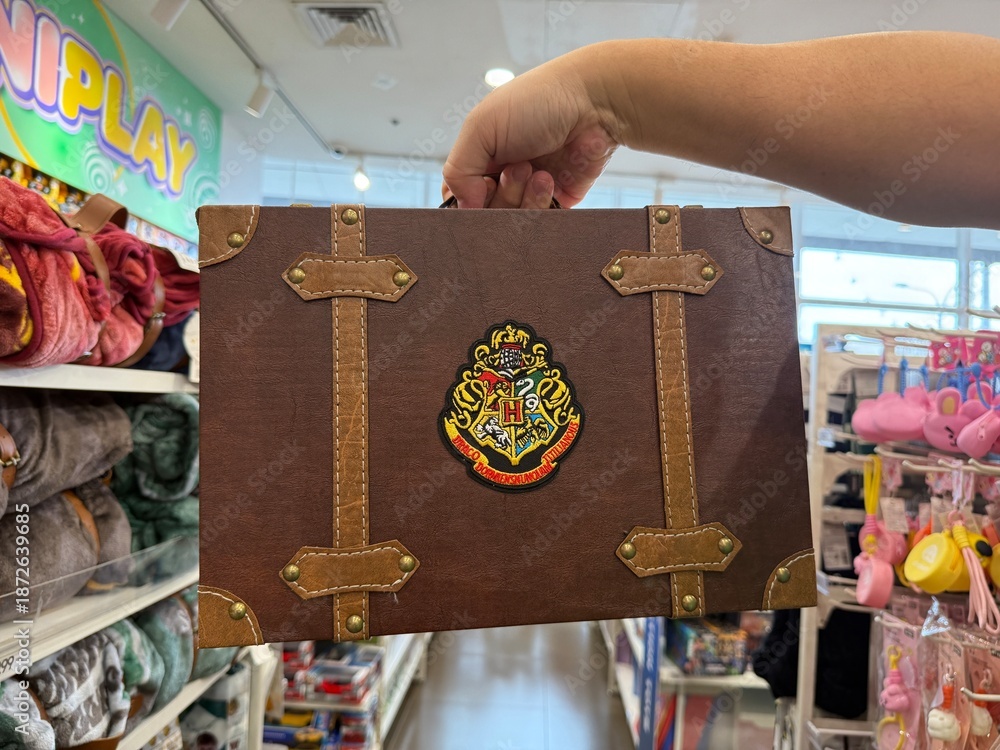 Naklejka premium January 2026, SM San Jose del Monte, Bulacan, Philippines: Miniso Harry Potter collection mini luggage mystery box