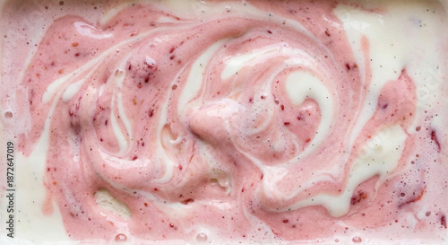 Melting strawberry and vanilla ice cream swirl texture