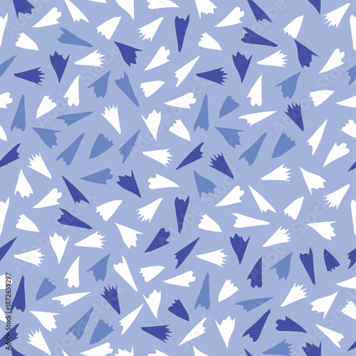 Abstract seamless pattern with scattered blue and white shapes on a light background