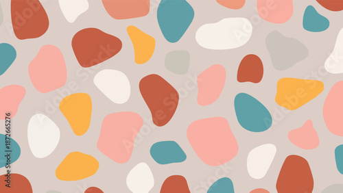 Abstract pattern of colorful, irregular shapes on a soft gray background