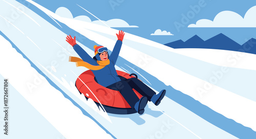 Joyful person in winter clothing sliding down a snowy hill on a bright red inflatable snow tube with arms raised high.