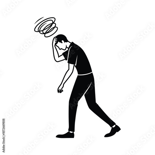 A distressed man clutches his head appearing overwhelmed and experiencing mental or emotional strain