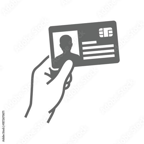 A hand presenting an identification card showcasing a silhouette of a person and card details