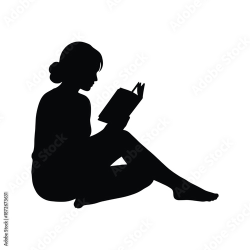 A silhouette of a woman peacefully absorbed in reading a book seated in a relaxed posture