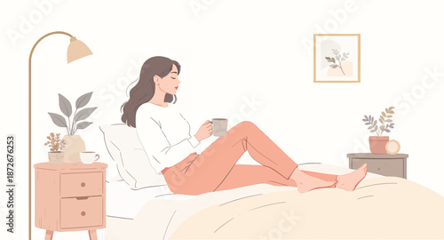 Woman Relaxing in Bed with a Cup of Coffee or Tea.