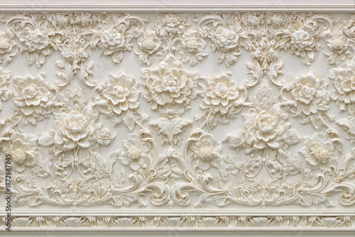 Intricate ivory floral relief sculpture forms a sophisticated decorative architectural panel