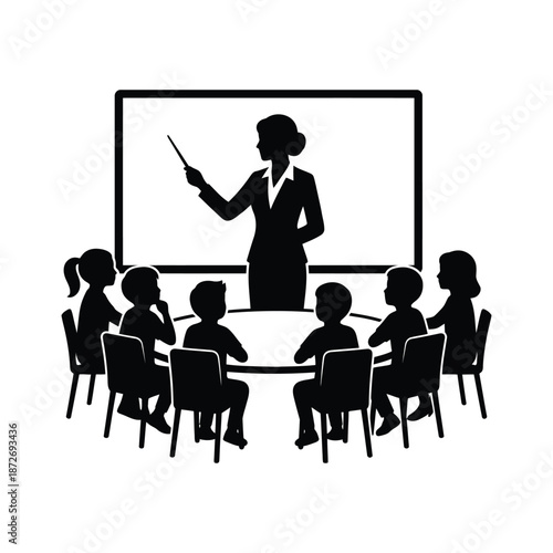 A silhouette of a teacher instructing a classroom full of students seated around a table