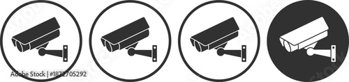Four surveillance cameras in black and white circles