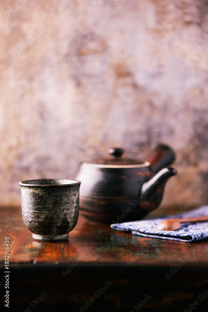 Fototapeta premium Traditional japanese ceramic on rustic wooden background. Soft focus. Copy space.