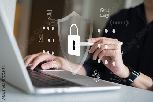 Businessman working on laptop computer smartphone using online internet login padlock shield database data information server, confidential safety privacy password protection encryption concept