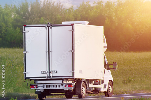 Tableau sur toile Temperature controlled delivery truck on country road
