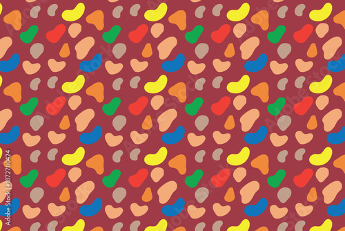 This image displays a seamless, abstract repeating pattern on a dark maroon background. It features colorful, scattered shapes resembling kidney beans and small irregular blobs. The shapes are rendere
