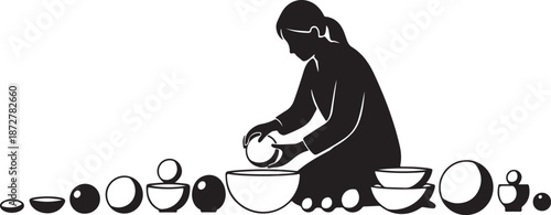 Silhouette of a woman surrounded by pottery and ceramic bowls