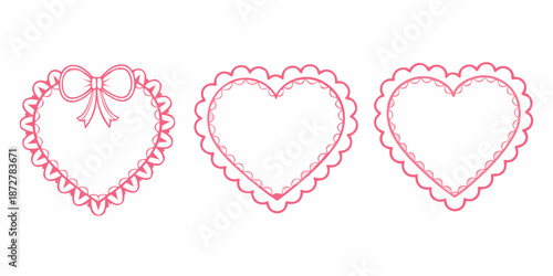 A collection of three pink heart shaped frames with decorative edges