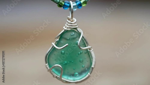 A beautifully crafted necklace with a vibrant green pendant, perfect for everyday wear