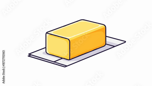 A solid yellow butter block sits on a light grey rectangular paper wrapper