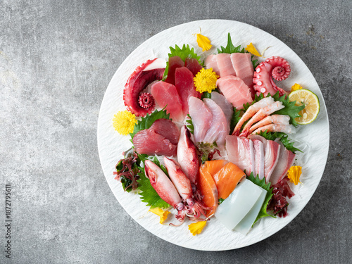 Wallpaper Mural A variety of raw fish and seafood on a plate Torontodigital.ca