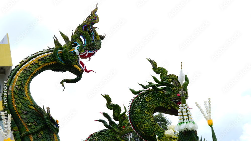 Fototapeta premium Close-up of ceremonial Thai Bai Sri offerings shaped as the legendary Great Serpent or Naga.