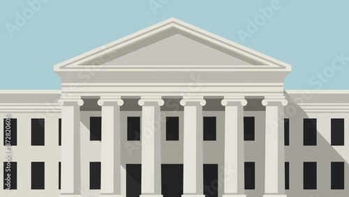 Classical government building with grand columns and a symmetrical facade under a blue sky.