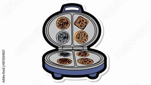 An open waffle maker with four waffles cooking