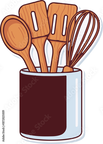 A wooden spoon, spatulas, and whisk stand in a deep container